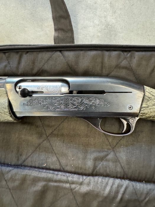 Left hand Remington 1100 Semi auto 12ga