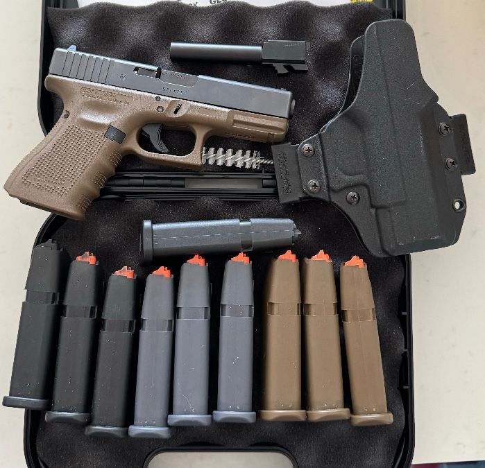 Glock 19 Gen 4 FDE with a lot of mags, range bag…