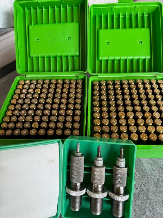 200 7mm cases-  ammo boxes -- 3 piece die set